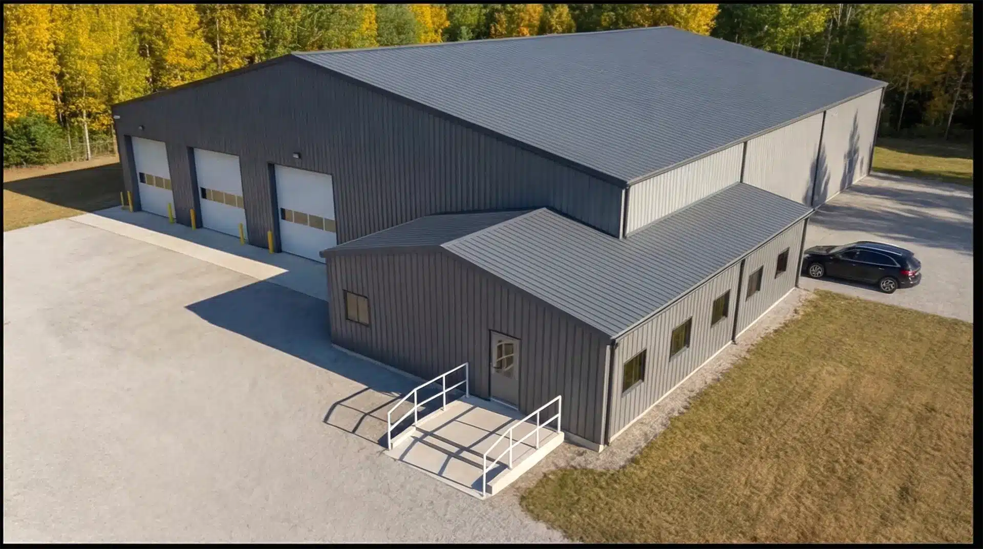 Custom agricultural steel building with post frame and wainscoting.