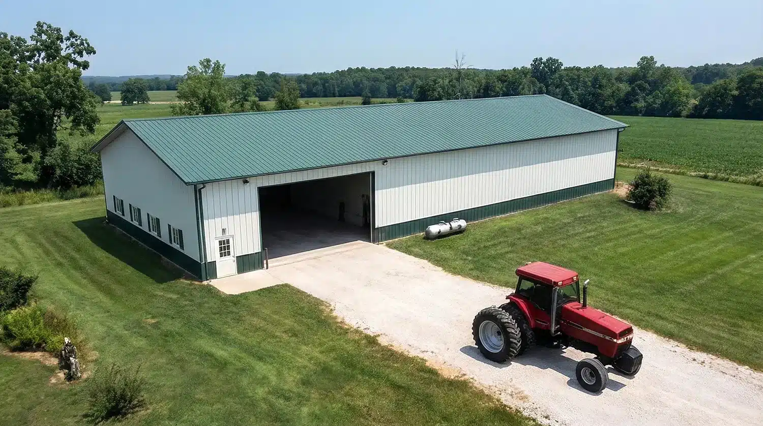 Aerial view of a 120x60 steel barn with green roof in Thunder Bay, Ontario.