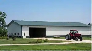 Front view of a 120x60 steel agricultural building with tractor in Thunder Bay.