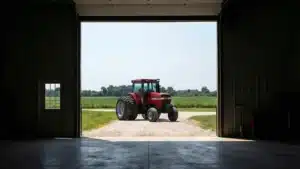 Interior view of 120x60 metal barn with tractor, Thunder Bay, Ontario.