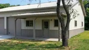 Steel barn with a porch in Peterborough, Ontario.