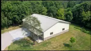 60x42 metal storage shed in a green landscape, Peterborough, Ontario