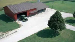 Aerial view of a 60x66 steel barn with a tractor in Waterloo, Ontario.