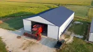 Aerial view of a 90x54 steel barn with a red tractor inside in Windsor, Ontario.