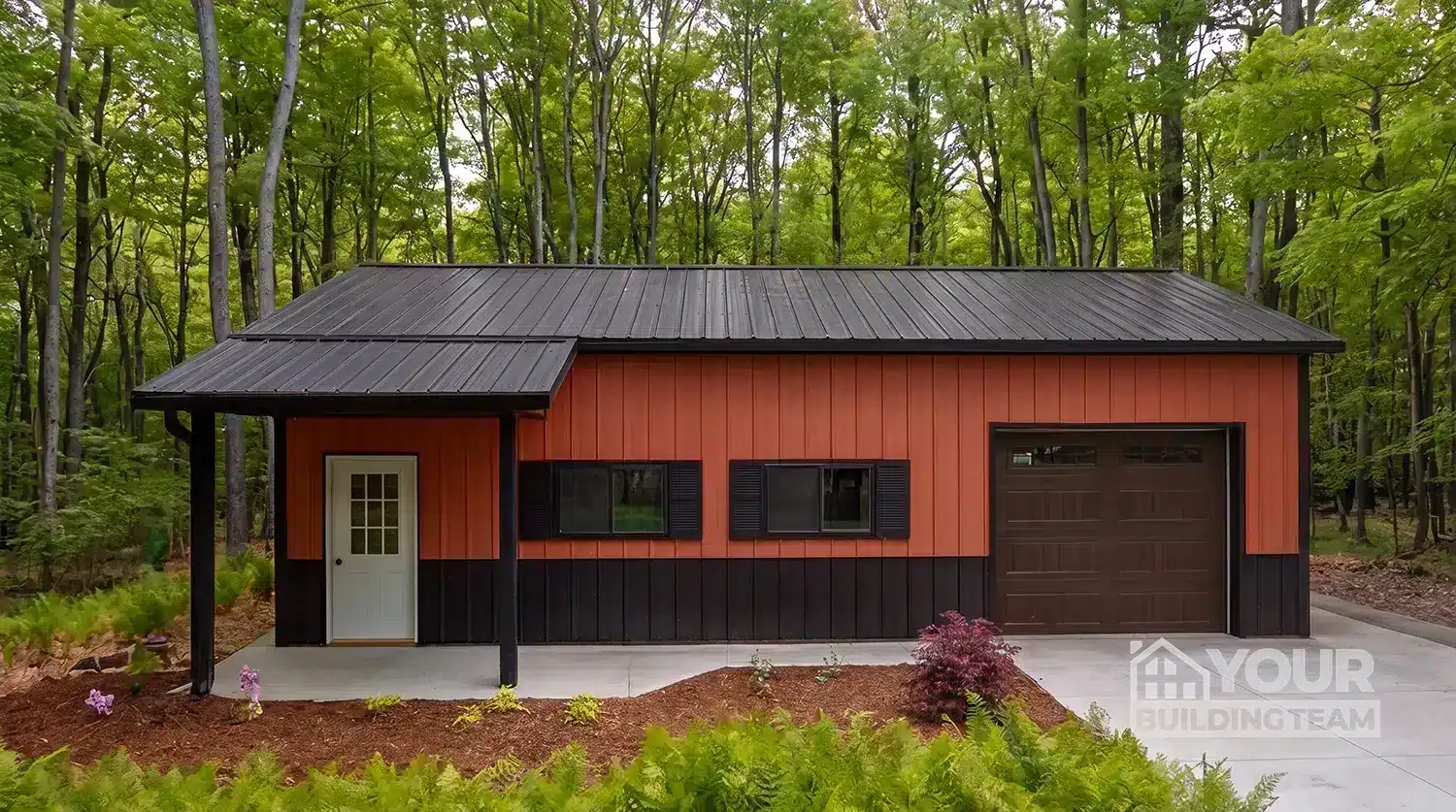 Front view of red metal garage in Lunenburg, showcasing durable steel construction.