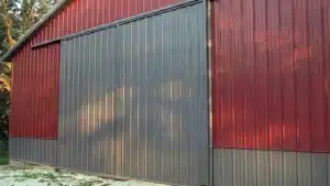 Steel barn with sliding door detail in Hamilton, Ontario.